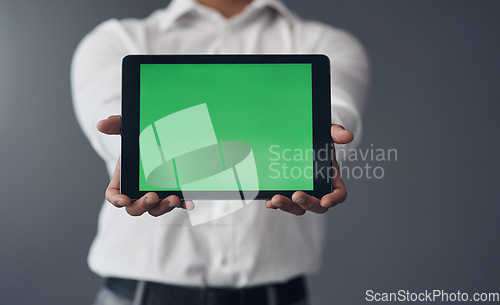 Image of Green screen, tablet and business man hands for advertising, space and website design isolated on studio background. Professional person on digital technology mockup for career marketing and internet