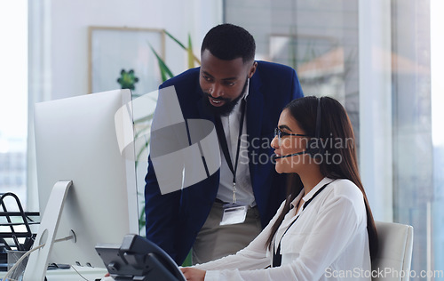 Image of Black man, call center and woman with coaching by computer, office and learning in tech support. African male crm, mentor and teaching for telemarketing, training and customer service at help desk