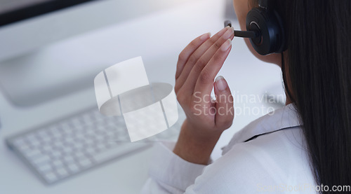 Image of Closeup, business and woman with headphones, telemarketing and call center with advice, connection and advice. Female person, employee and agent with a headset, tech support and customer service
