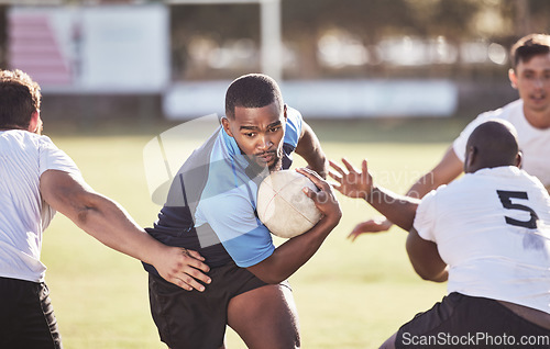 Image of Sports, rugby and men running with ball on field for match, practice and game in tournament. Fitness, teamwork and sport players tackle for exercise, training and performance for competition on grass