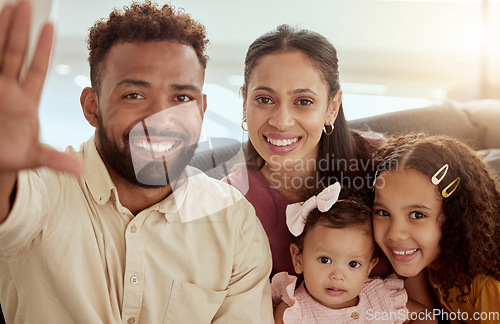 Image of Parents, girl children and selfie on sofa with happiness, hand and photography for blog, post or portrait in family home. Father, mother and daughters with smile, social media app and profile picture