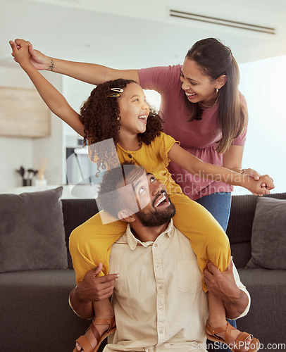 Image of Family home, pretend airplane and kid with mom, dad and young girl together with fun. Living room, mother and father with a child by sofa with love, bonding and parent support with a smile in lounge