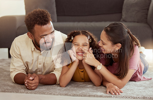 Image of Family home, playing and kid with mom care, dad and young girl together with fun. Living room, mother and father with a child by sofa with love, bonding and parent support with a smile in lounge