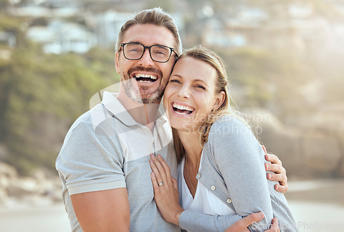 Image of Happy, smile and portrait of couple at beach for love, travel and summer vacation. Happiness, holiday and romance with man and woman hugging on seaside date for bonding, affectionate and care