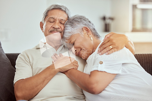 Image of Love, relax and hug with old couple on sofa for affectionate, bonding and happiness. Retirement, happy and calm with senior man and woman in living room of home for embrace, safety and trust