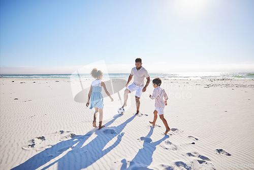 Image of Soccer, family and ball at the beach with freedom, happy and bonding in nature. Sports, football and children with father at the ocean for travel, vacation and game while traveling together in Mexico
