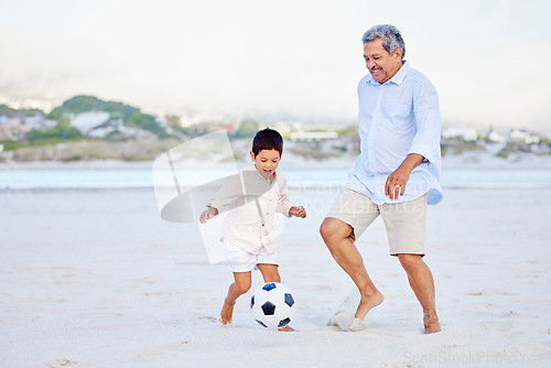 Image of Beach, soccer and grandfather playing with child on vacation or holiday happy for sand football or sports. Travel, summer and elderly man kicking a ball with kid at the sea or ocean together