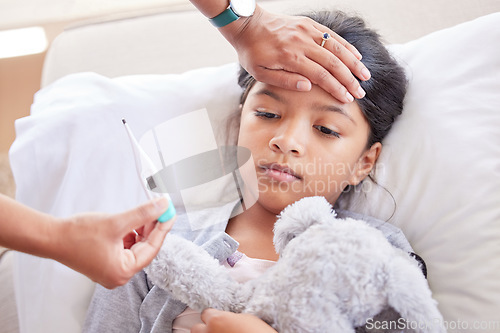 Image of Sick, worry and thermometer with mother and child in bedroom for support, illness and healthcare. Virus, pain and help with hand of woman and young girl in family home for care, love and fever