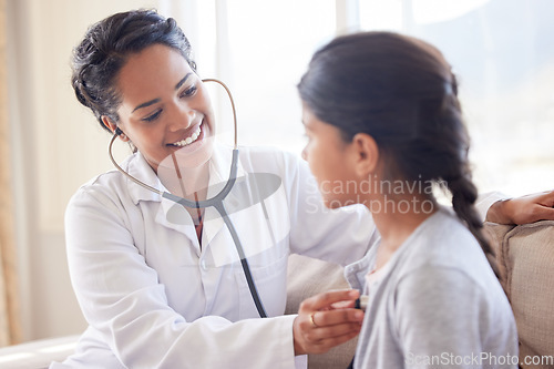 Image of Doctor, cardiology and young child at a hospital and clinic for health consultation with a smile. Healthcare, wellness and pediatrician with kid listening to heart for medical consulting with expert