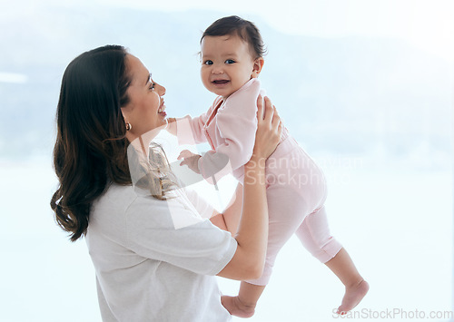 Image of Baby laugh, portrait and mom in a home with newborn, care and parent love together feeling happy. Face, family and young child with mother and happiness in house with mama and childcare in lounge