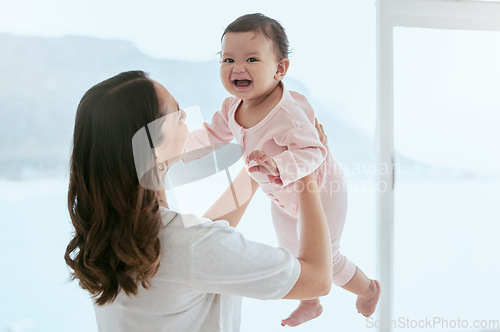 Image of Baby laugh, portrait and mom in a home with newborn, care and parent love together with fun. Face, family and young child with mother back in a living room in house with mama and childcare in lounge