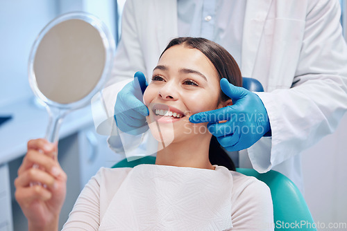 Image of Dentist, mirror and woman with smile after consulting for teeth whitening, service and dental care. Healthcare, dentistry and female patient with orthodontist for oral hygiene, wellness and cleaning