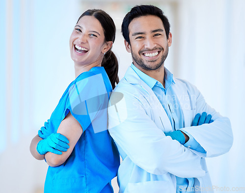 Image of Dentist, laugh portrait and arms crossed with assistant and funny joke at dental office and clinic. Comedy, woman and healthcare professional with happiness and laughing in workplace with smile