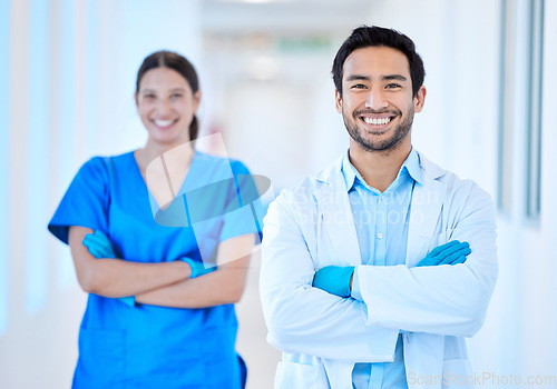 Image of Dentist, portrait and arms crossed with woman assistant and motivation at dental office and clinic. Success, happy worker and healthcare professional in medical workplace for orthodontist consulting