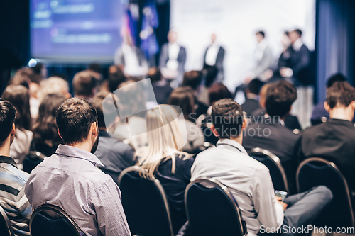 Image of Round table discussion at business conference meeting event.. Audience at the conference hall. Business and entrepreneurship symposium.