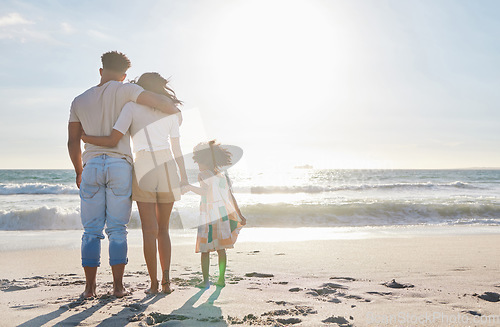 Image of Family, back with parents and child on beach, travel and people together on sand with sea view and mockup space. Love, care and sun, man with woman and girl outdoor, tourism and vacation in Mexico