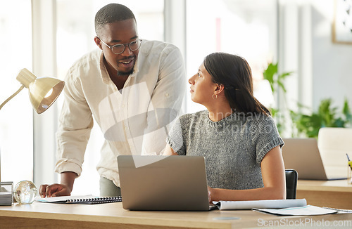 Image of Laptop, black man or manager coaching a woman for advice, leadership or research in digital agency. Project, boss or person helping, training or speaking of SEO data or online business to employee