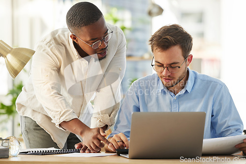 Image of Laptop, black man or manager coaching a worker with notes or research project in digital agency. Paperwork, boss or person helping, training or speaking of SEO data or online business to employee