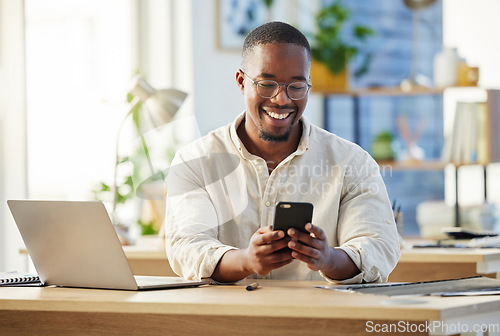 Image of African business man, texting and phone in office with smile, connection and meme on social media app. Happy black businessman, typing and smartphone for networking, contact and reading blog on web