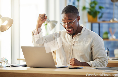 Image of Black business man, celebration and laptop with smile, winning or excited for profit, trading or promotion. African businessman, winner and celebrate by computer, gambling or esports in modern office