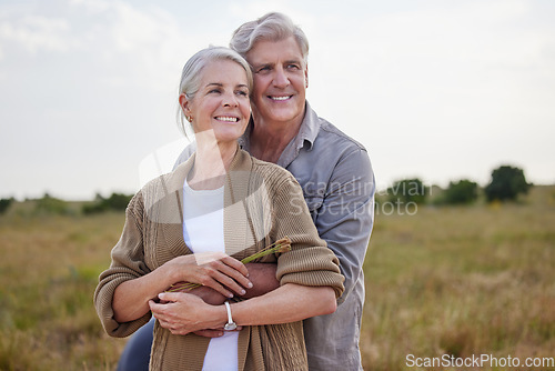 Image of Love, hug and happy with old couple in nature for bonding, smile and romance. Happiness, retirement and support with senior man and woman in countryside for affectionate, holiday and vacation