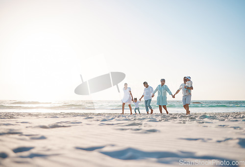 Image of Big family, holding hands and holiday on beach with mockup space for weekend or vacation. Grandparents, parents and kids walking together on the ocean coast for fun bonding or quality time in nature