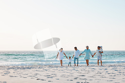 Image of Big family, holding hands and walking on beach with mockup space for holiday weekend or vacation. Grandparents, parents and kids on a ocean walk together for fun bonding or quality time in nature