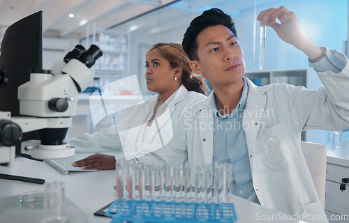 Image of Sample analysis, science and scientist in a lab for research, chemistry test and chemical work. Futuristic, physics and a male laboratory technician with liquid for pharmaceutical exam and innovation
