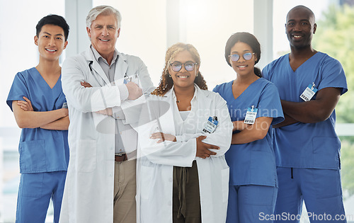 Image of Leadership portrait, smile and doctors with arms crossed standing together in hospital. Face, teamwork and confident medical professionals, surgeon group and nurses with collaboration for healthcare.