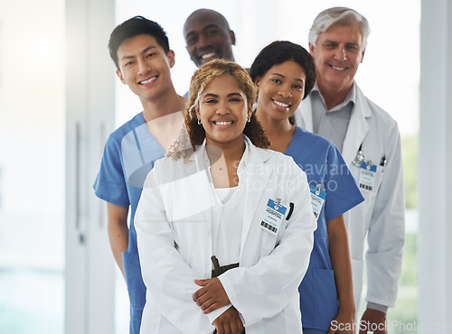 Image of Portrait, nurses and team of doctors in line, smile and standing together in hospital. Face, healthcare and medical professionals, group diversity or happy surgeons in collaboration for leadership.
