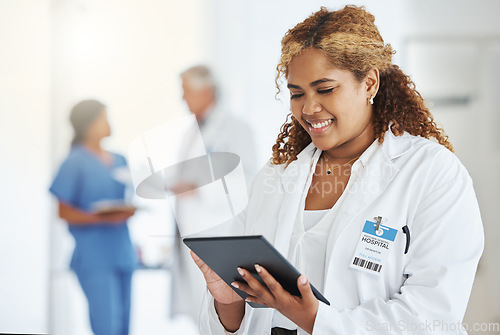 Image of Smile, woman and doctor with tablet for research, telehealth or healthcare in hospital. Technology, medical professional and African female surgeon with email, wellness app and online consultation.