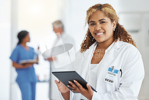 Image of Portrait smile, woman and doctor with tablet for research, telehealth or healthcare in hospital. Technology, medical professional and face of African female surgeon with wellness app in health clinic