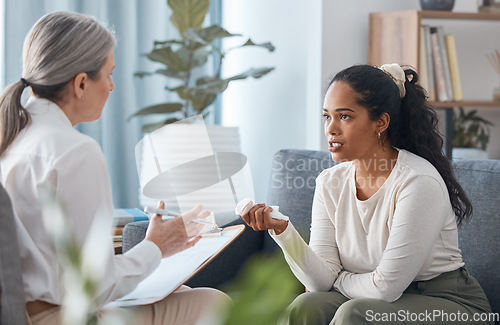 Image of Psychologist, therapy and woman talking in consultation for mental health in office. Therapist, psychology and female patient consulting, counseling and discussion for depression, stress and crying.