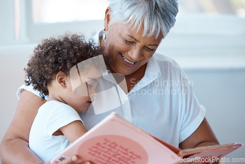 Image of Family, girl and grandmother reading a book, story and quality time with happiness, bonding and fairy tale. Granny, female grandchild or kid with fun, literature or learning to read at home and relax