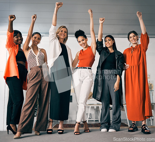 Image of Fist, power and business women standing together. for success, winning and gender equality or fight for human rights. Portrait, teamwork and group of people with empowerment, yes hands or celebration