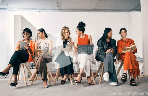 Image of Waiting room, networking and business women with job search on phone, tablet and laptop or notebook planning. Gender equality, diversity and group of people talking, teamwork and career collaboration