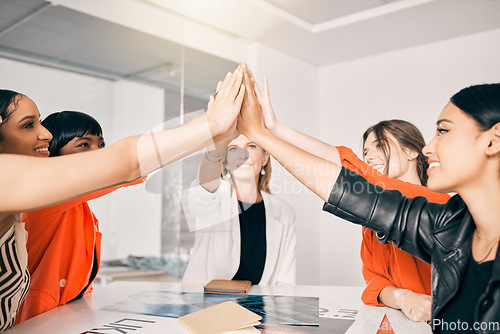 Image of High five, teamwork and business women in meeting celebration, success and collaboration for empowerment. Solidarity, gender equality and happy group of people, hands together and support in office