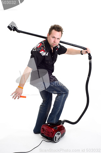 Image of Man with vacuum cleaner