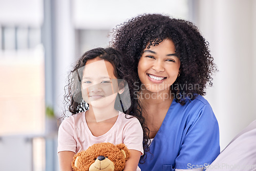 Image of Portrait, nurse and child on bed in hospital for children, health and support in expert medical treatment. Pediatric healthcare, kids and happy face of nursing caregiver with young patient at clinic.