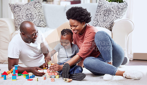 Image of Building blocks, toys and black family playing on a living room floor happy, love and bonding in their home. Child development, learning and kid with parents in a lounge with alphabet, shape and game