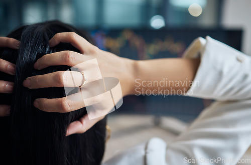 Image of Business woman, stress and hand on head for stock market crash, debt or review. Back of female broker at computer for SEO, trading and anxiety for fail or financial crisis, problem or investment risk