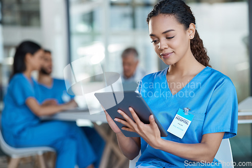 Image of Hospital, doctor and woman on tablet for medical analysis, research and diagnosis report. Healthcare, clinic and happy female nurse on digital tech for wellness app, online consulting and service