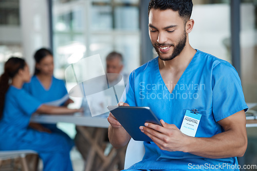 Image of Hospital, doctor and man on tablet for medical analysis, research and report in team meeting. Healthcare, clinic and happy male nurse on digital tech for wellness app, online consulting and service