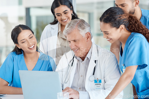 Image of Hospital, teamwork and doctors in meeting on laptop for medical analysis, research and internet. Healthcare, clinic and men and women on computer for telecommunication, online consulting and service