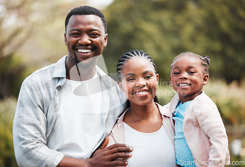 Image of Happy, portrait and black family outdoor, hug and bonding in a park, loving together and weekend break. Face, mother or father with female kid, daughter or embrace with child development and backyard