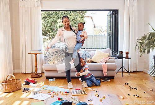 Image of Toys, children and mother with stress, laundry and home with tantrum, messy living room and anxiety. Family, mama and kids with housekeeping, burnout and mental health issue with untidy living room