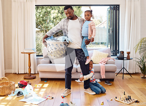 Image of Family, chaos and father with children in home shouting with anger, frustrated and upset emotions. Tantrum, discipline and tired dad with kids screaming with mess, laundry and toys in living room