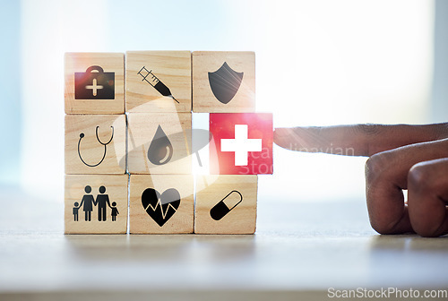 Image of Hand man and building blocks with medical icons for investment, security and insurance cover. Finger, choice and male with puzzle for healthcare, family or asset management, safety or future planning