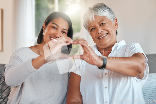 Image of Heart hands, portrait and elderly mother and daughter with care, affection or empathy. Love, hand gesture or senior mom with woman for support on mothersday, trust or kindness, family smile and emoji