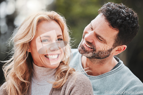 Image of Happy, portrait and a couple with love in nature for a date, marriage anniversary or bonding. Smile, laughing and a mature man and woman with affection, happiness and quality time in a park together